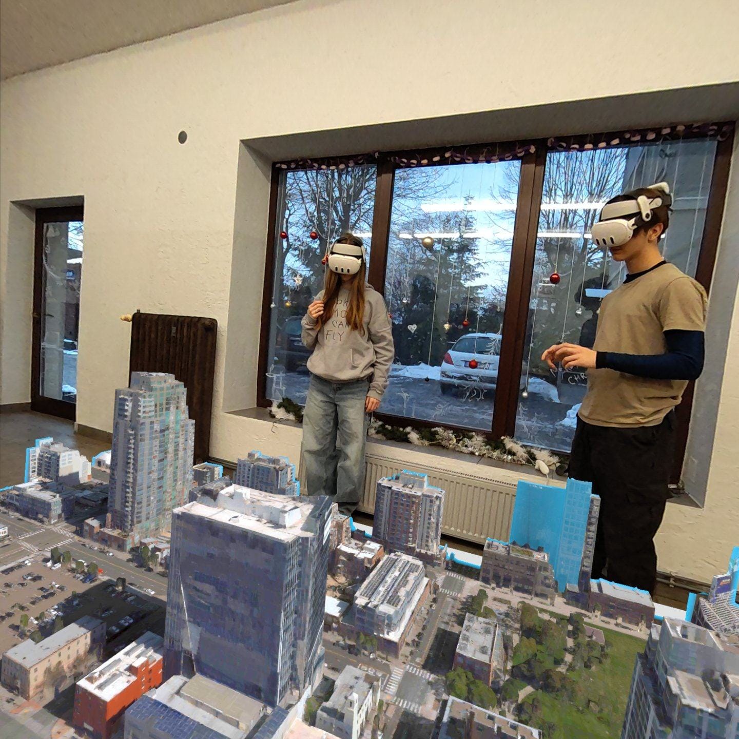 Participants wearing VR headsets on a virtual aerial tour of a city at Harmonia Primary School in Suchy Las