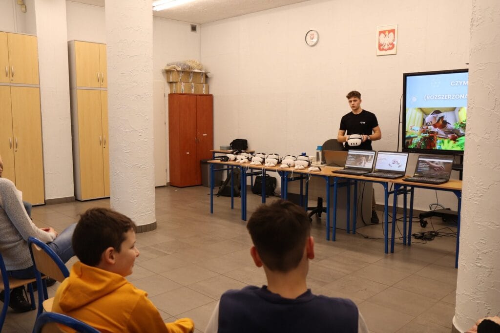 VR headsets arranged on tables before a class at Olimpus Primary School in Gutowo Małe