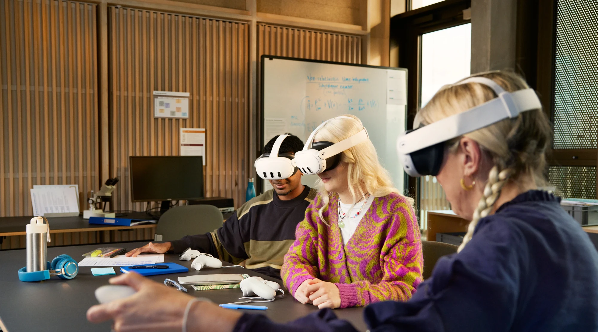 Students in a VR lesson using Meta Quest headsets