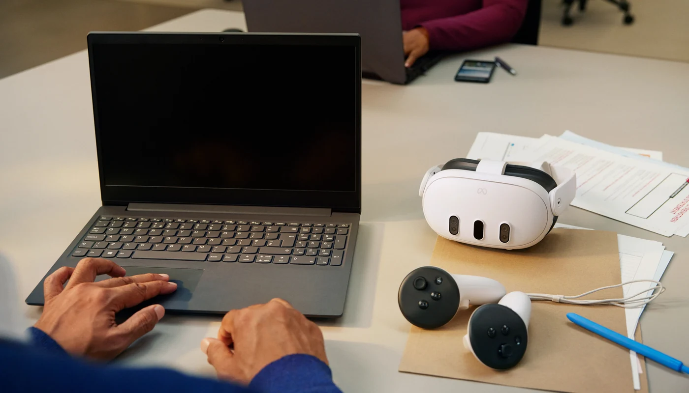 Computer and Meta Quest headset prepared for use