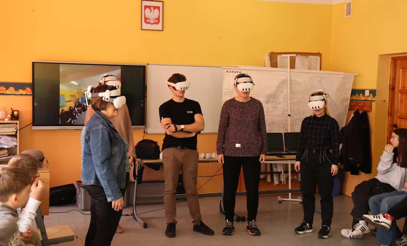 A ZenithXR instructor leading a VR lesson at a school