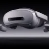 White PICO 4 Ultra Enterprise headset with two controllers against a dark background