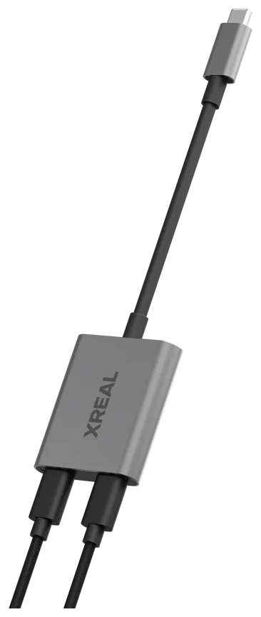 XREAL Hub z przewodami podłączonymi do obu portów USB-C